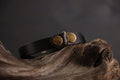 Black leather cat collar with antique bronze D-ring and smooth finish.