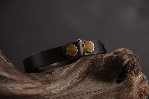 Black leather cat collar with antique bronze D-ring and smooth finish.