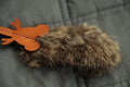 Handcrafted mouse cat toy with leather ears, whiskers, and fur body.